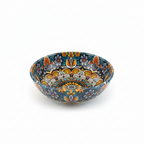 Decorative bowl with a colorful pattern on a white background