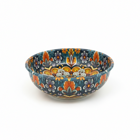 Decorative ceramic bowl with floral patterns on a white background
