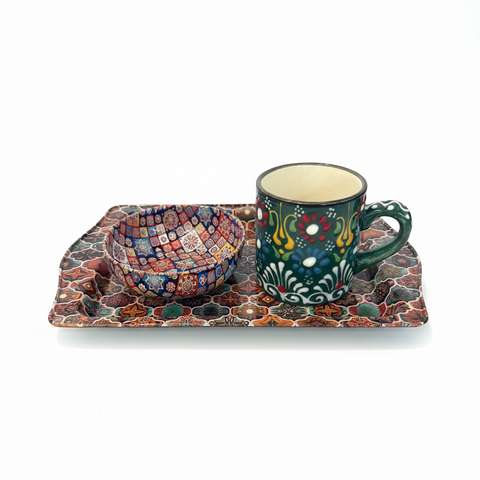 Ceramic mug and bowl set on a decorative tray with a white background