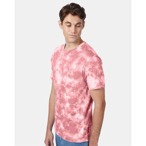 Man wearing a pink tie-dye t-shirt on a white background