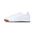 A white low-top sneaker by Hummel, featuring a white leather upper, matching white laces, a white midsole, and a contrasting brown gum outsole, shown in a side profile on a white background.