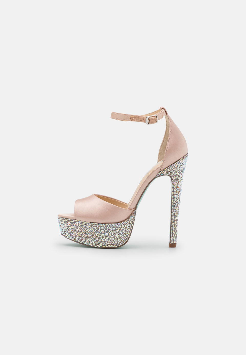 Pink high-heeled shoe with crystal embellishments on a white background