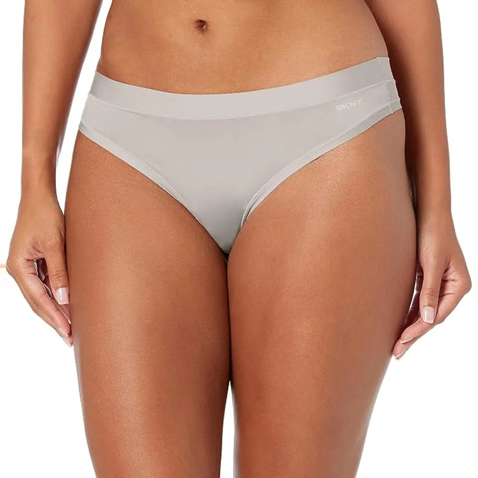 A model wearing light gray DKNY high-waisted briefs, shown from the waist to upper thighs against a plain white background.
