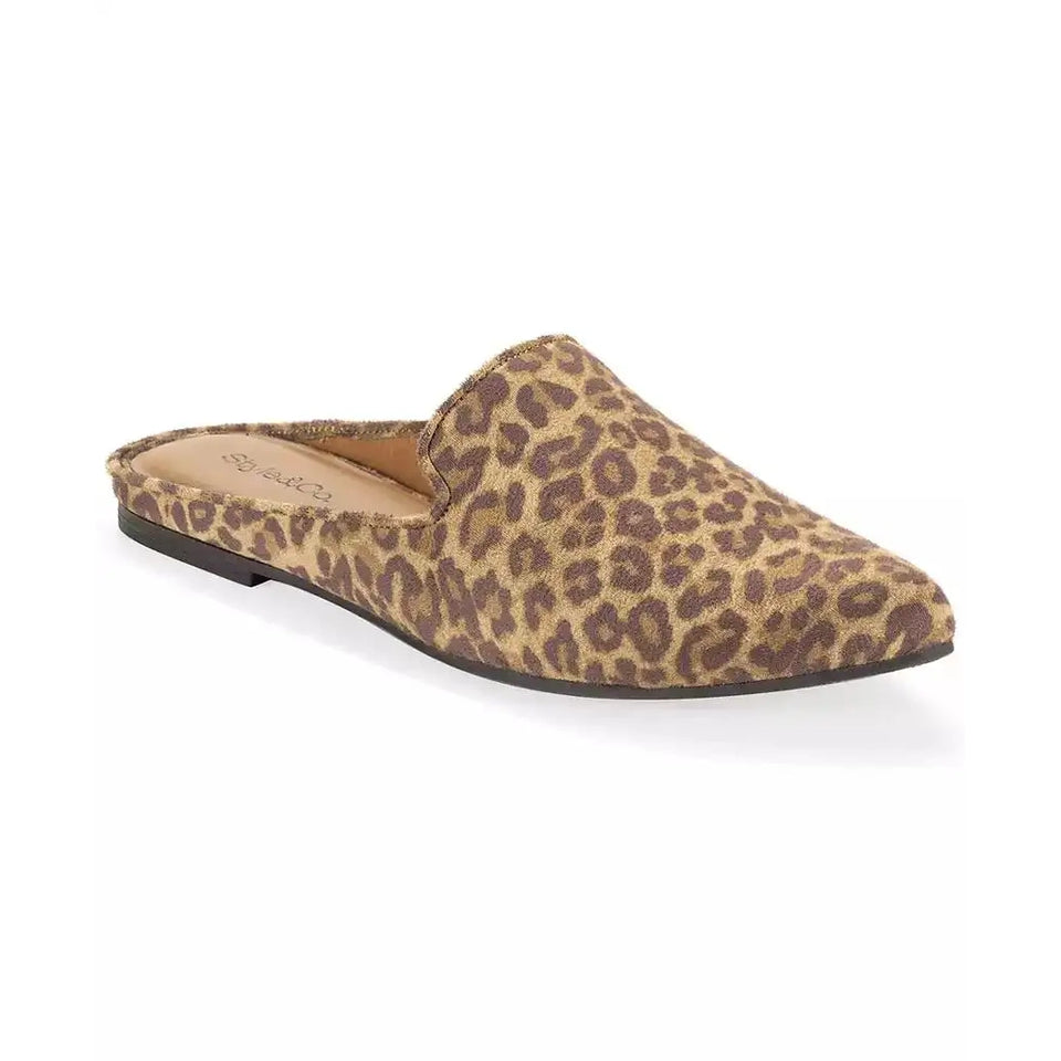 A single slip-on mule shoe with a brown and beige leopard print pattern, shown from a side profile on a white background.