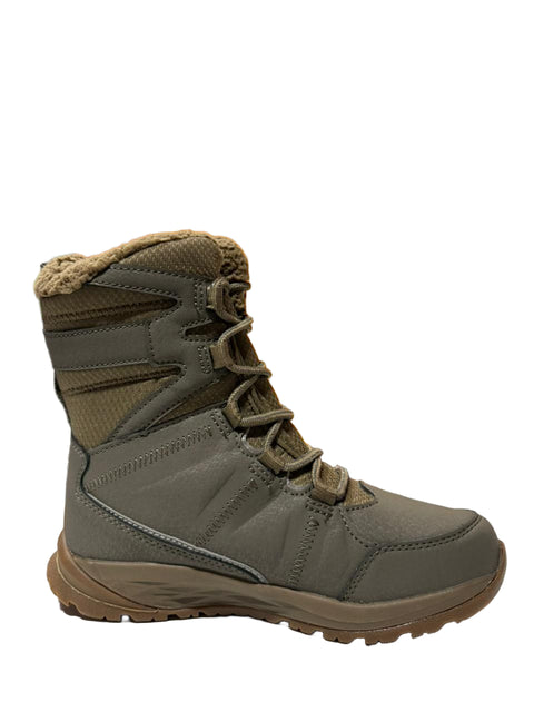 Gray winter boot with brown sole on a white surface, with a blurred background