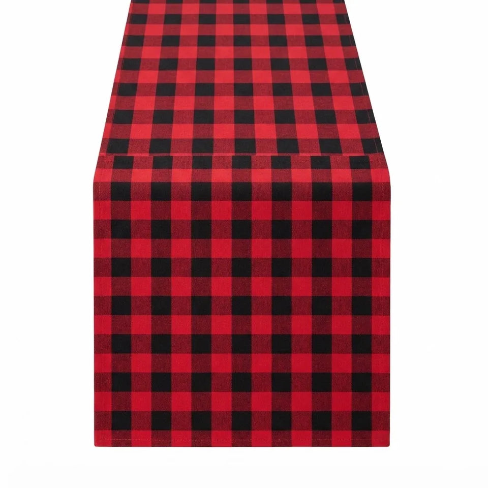 A red and black buffalo plaid table runner shown flat against a solid white background.