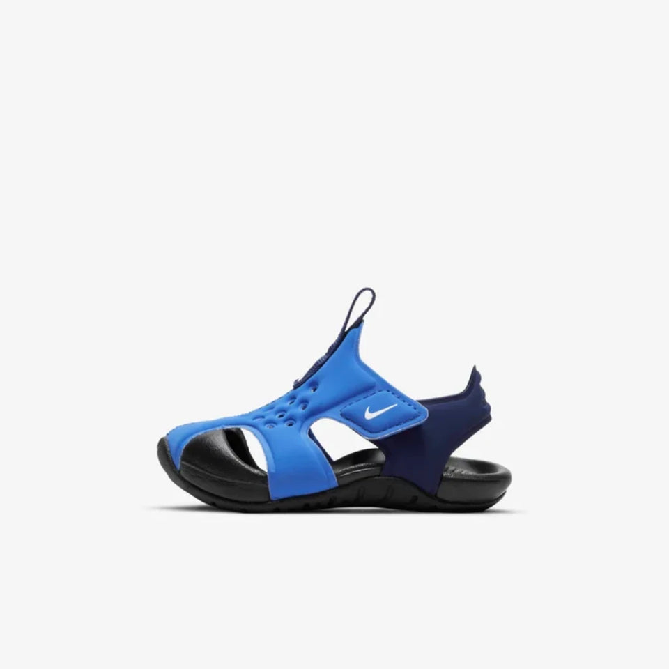 Blue and black sandal with Nike logo on a white background