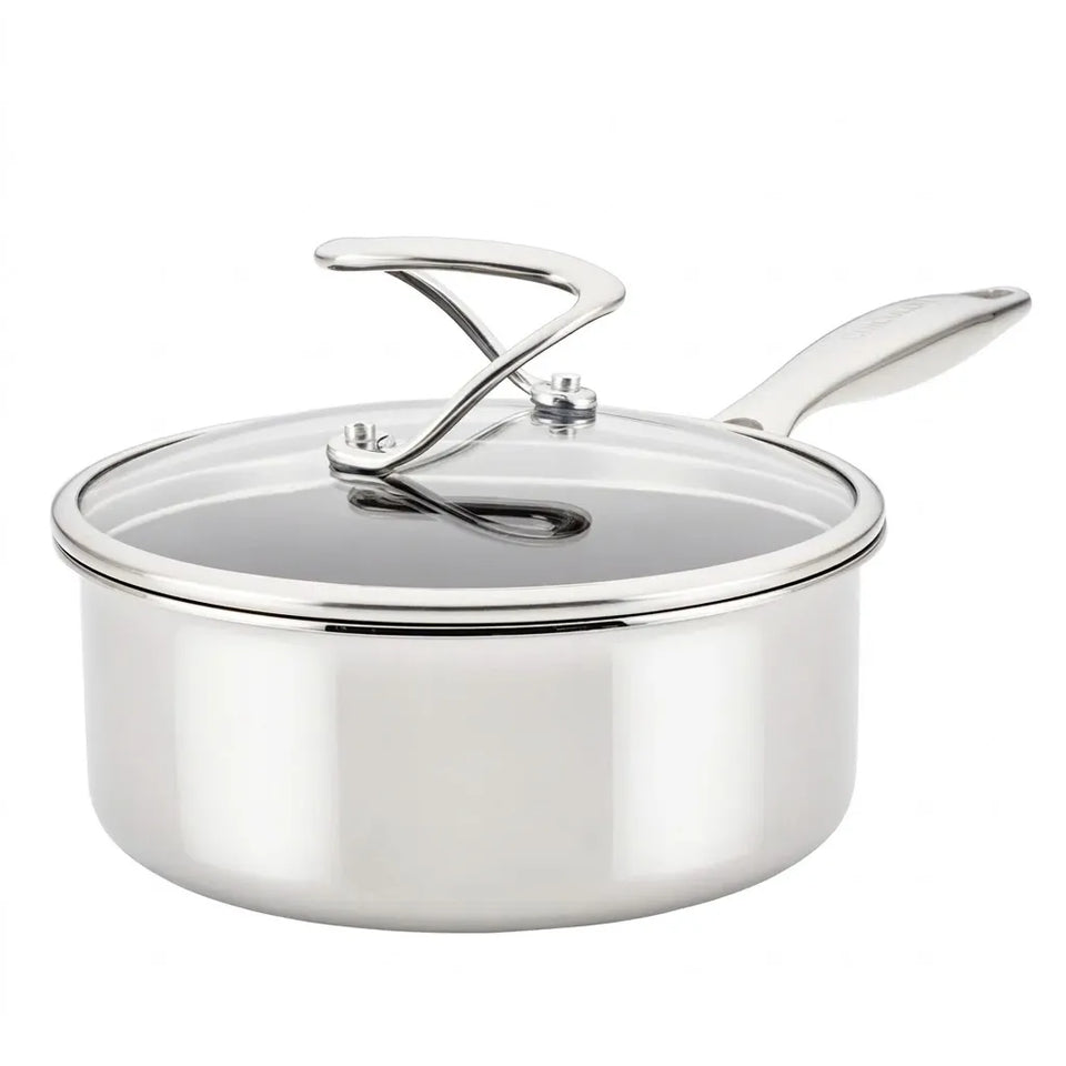 Stainless steel saucepan with lid on a white background