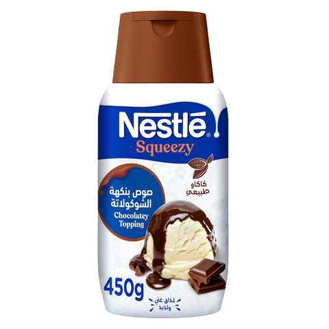 Nestle Squeezy chocolatey topping bottle on a white background