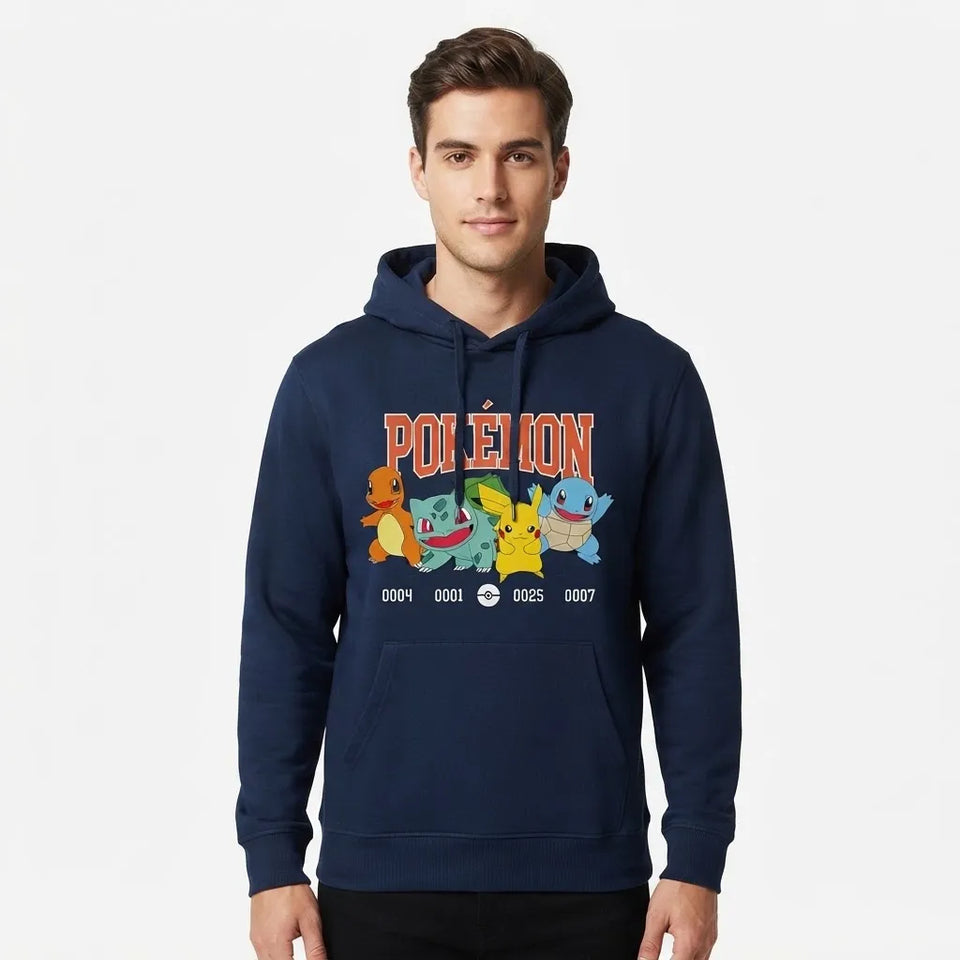 A man wearing a navy blue pullover hoodie with a colorful 'Pokémon' graphic on the chest, featuring the red-orange logo and several classic Pokémon characters, set against a plain light gray background.