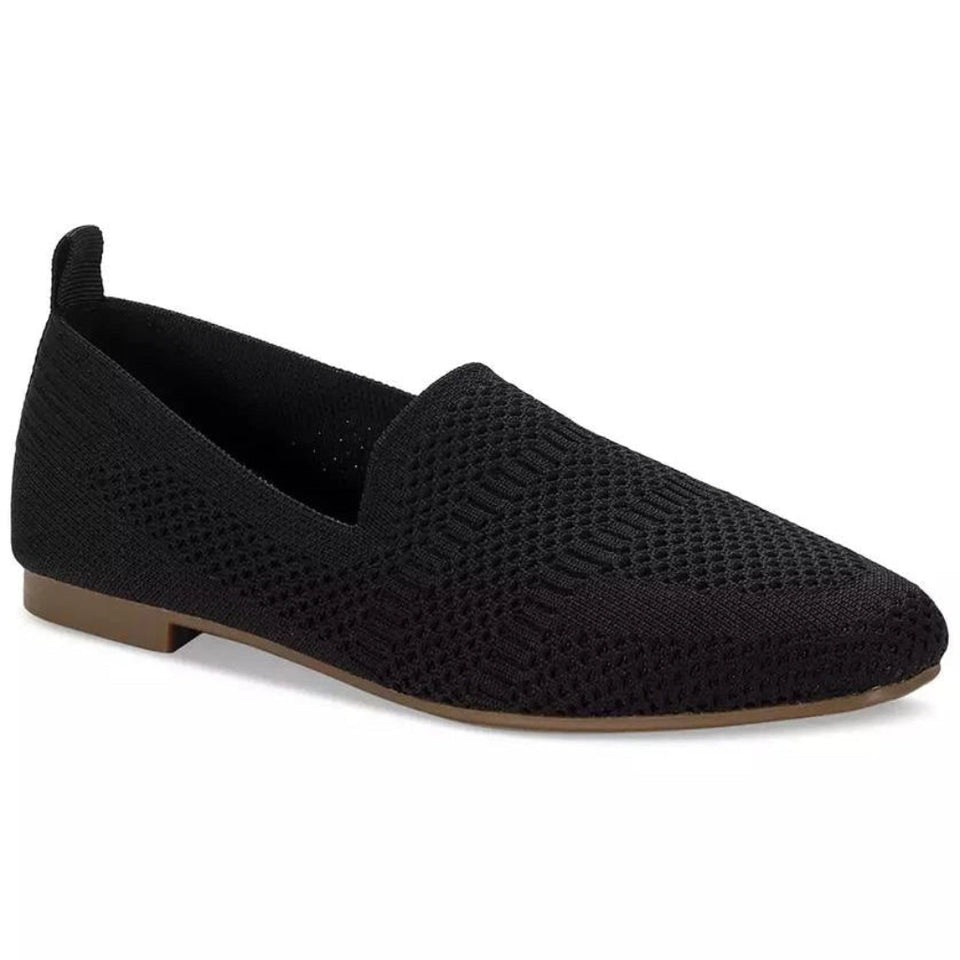Black loafer shoe on a white background
