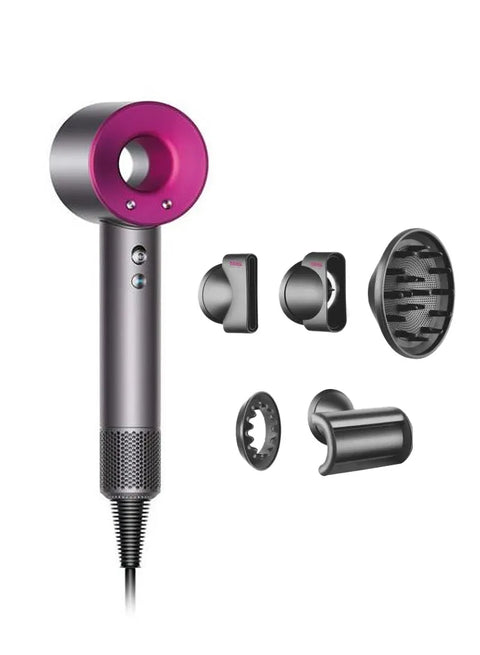 Hair dryer with multiple attachments on a white background