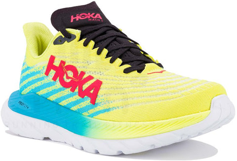 Yellow running shoe with black and blue accents on a white background
