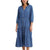 A woman modeling a blue denim midi dress with three-quarter sleeves, a button-down front, and a tiered skirt, paired with white socks and beige sneakers against a plain white background.