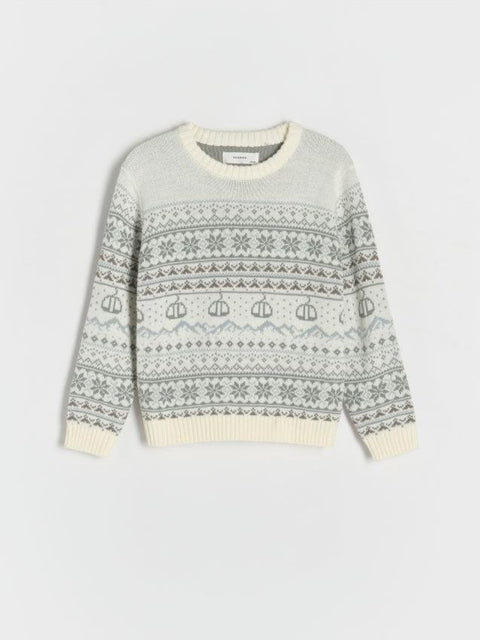 Light gray sweater with a pattern on a light gray background