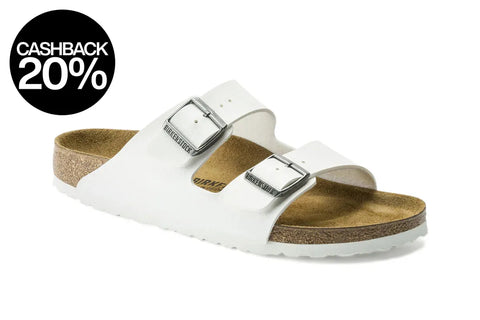 White sandal with cork sole on a white background