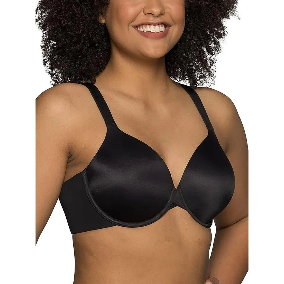 A woman wearing a black seamless underwire bra against a plain white background.