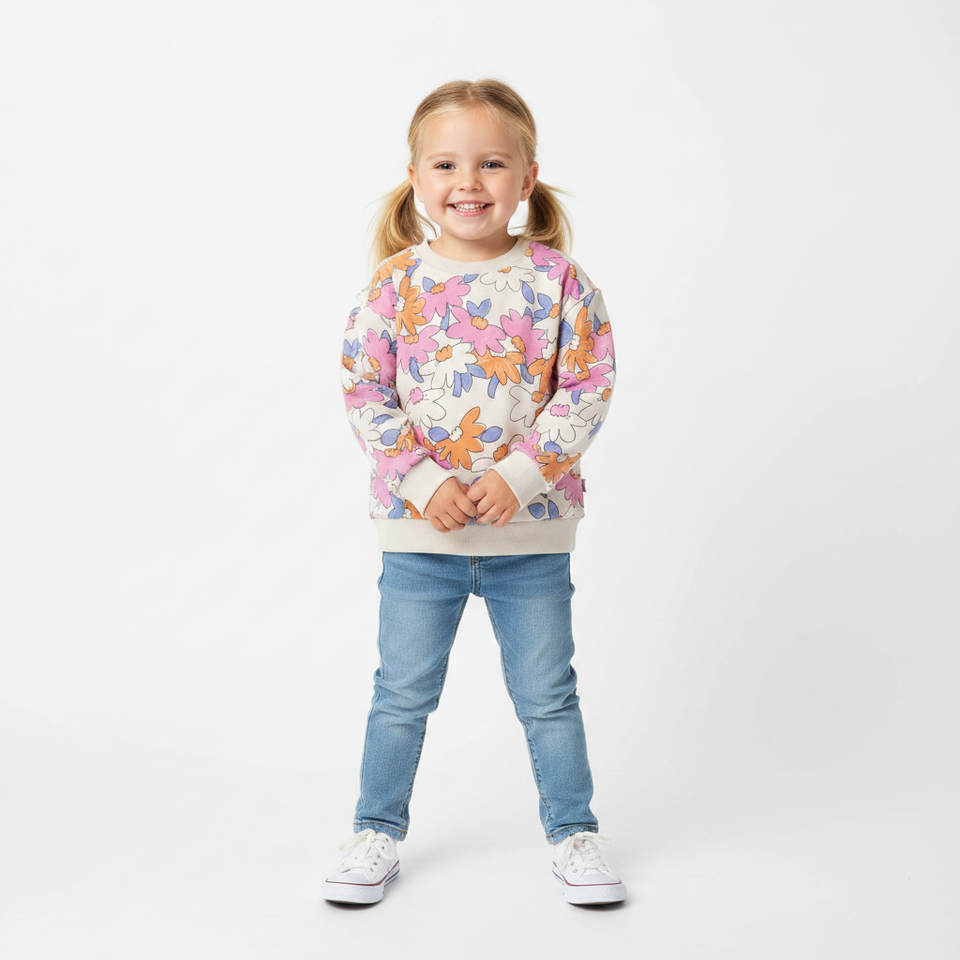 Girl wearing light grey floral sweatshirt