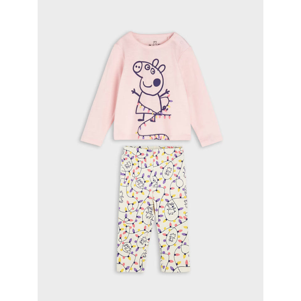 A two-piece children's pajama set featuring a light pink long-sleeve top with a Peppa Pig graphic and matching patterned pants on a light gray background.
