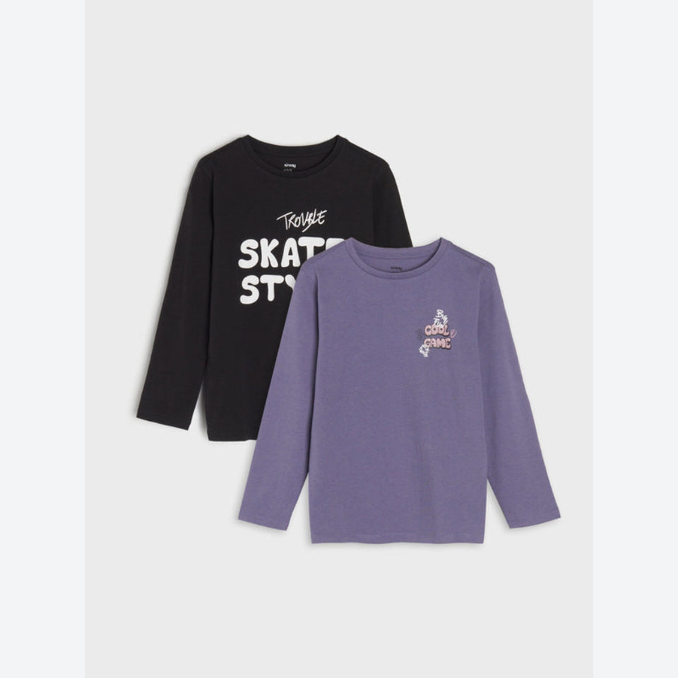Two long-sleeve crewneck shirts for kids, one black with white 'TRUGUE SKATE ST.