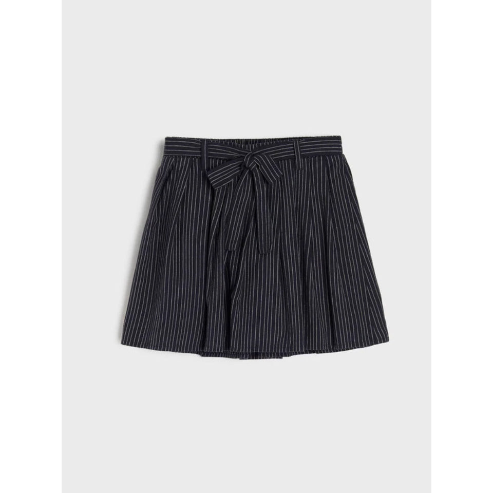 A dark navy blue pleated skirt with thin white vertical pinstripes and a matching fabric tie belt at the waist, shown flat on a light gray background.