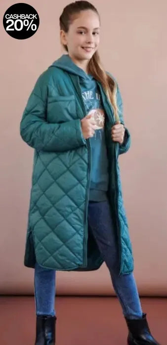 Person wearing a teal quilted coat against a pink background