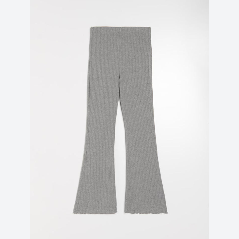 A pair of light gray ribbed flare leggings shown flat against a light gray background.