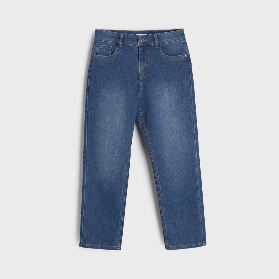 A pair of medium-wash blue denim jeans with a straight-leg fit, shown flat against a light gray background.