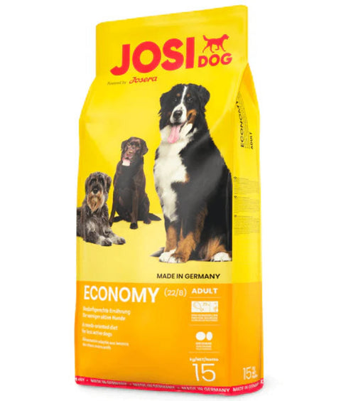 Yellow package of Josi Dog Economy dog food with images of dogs on a white background