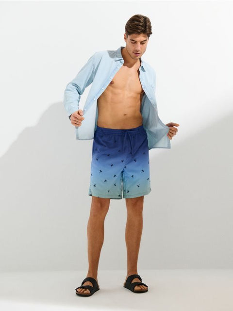 Sinsay Men’s  Blue & Teal Dragonfly Print Swim Shorts | Sinsay in Lebanon