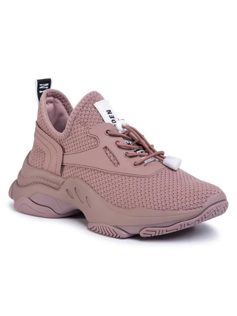 Pink sneaker with a white sole on a white background