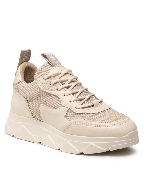 Beige sneaker with a thick sole on a white background