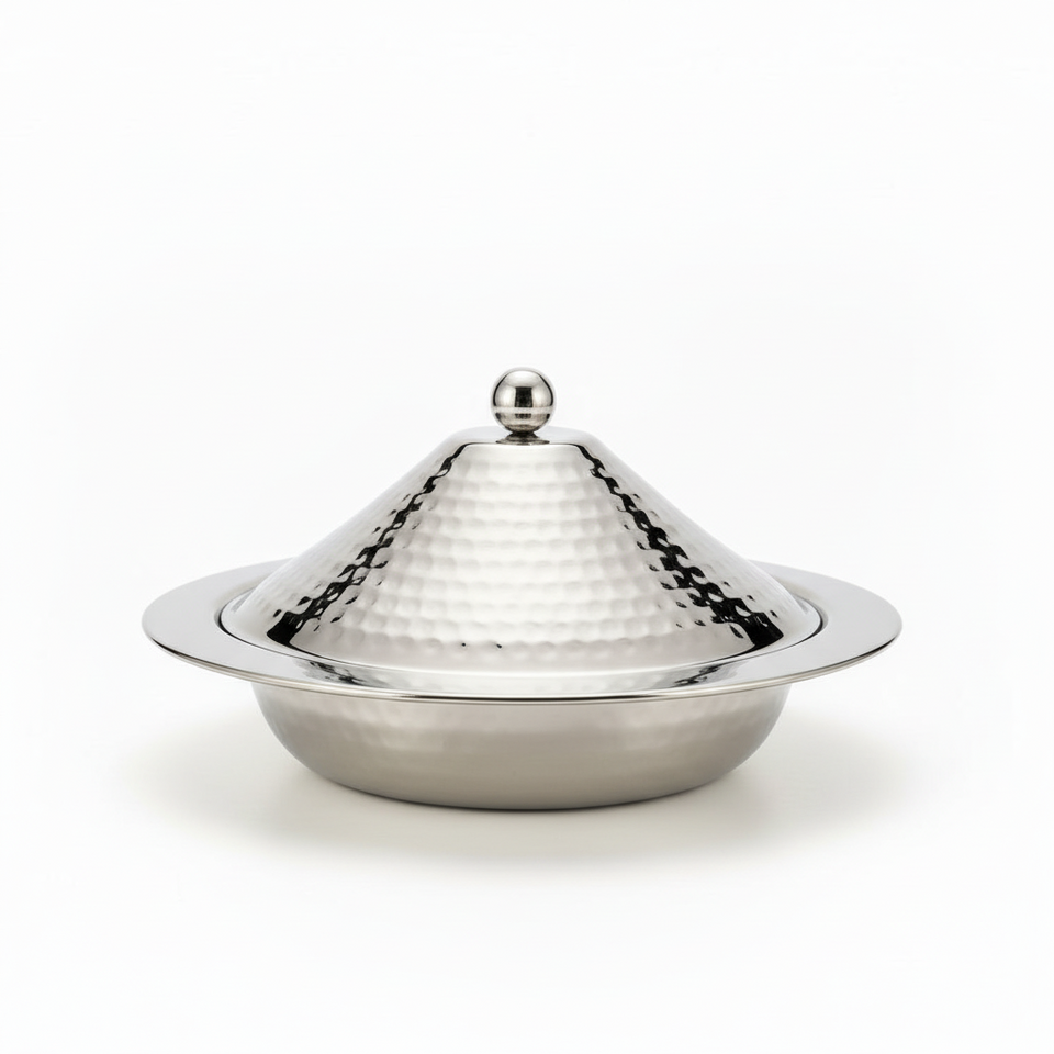 Stainless steel covered dish on a white background