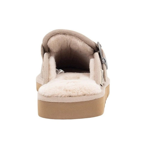 Beige slipper with white lining on a white background