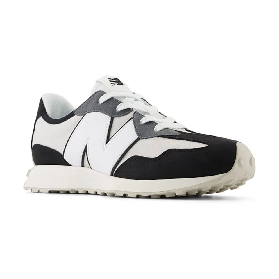 Black and white sneaker with New Balance logo on a white background
