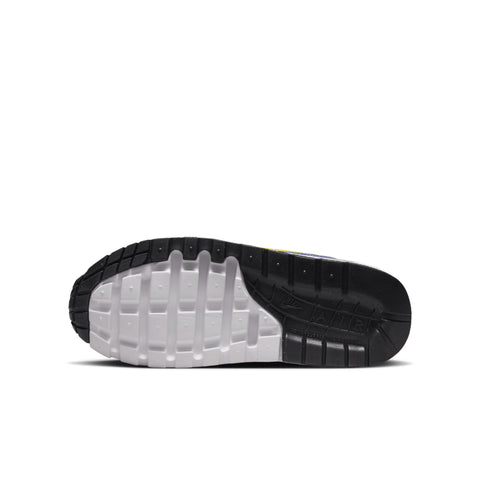 Close-up of a black and white shoe sole on a white background