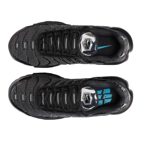 Black athletic shoes with a brand logo on a white background