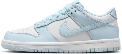 Light blue and white sneaker with Nike logo on a white background