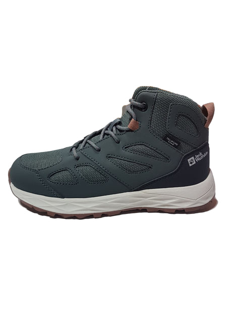 Gray hiking boot on a white surface with an orange wall and green dinosaur toy in the background