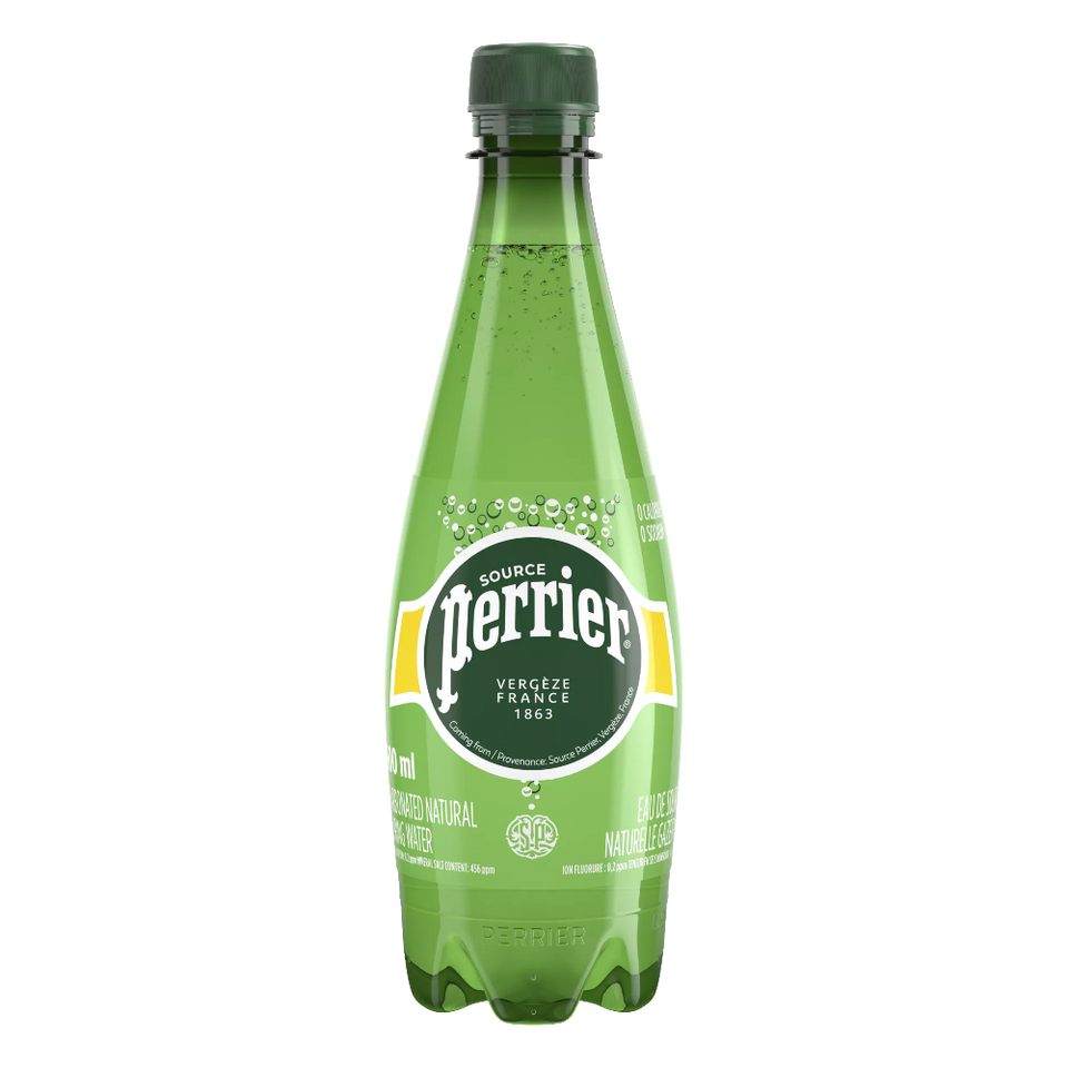 Green Perrier bottle on a white background