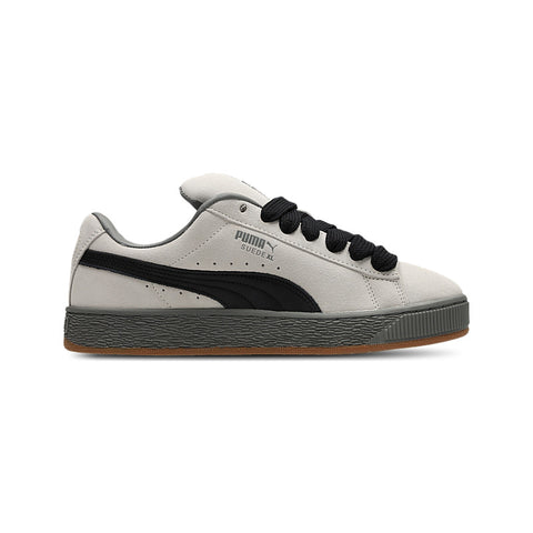 White and black sneaker with Puma logo on a white background