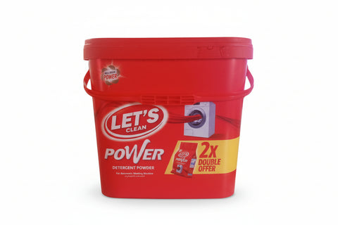 Red 'Let's Clean' detergent powder bucket on a counter with a store interior background.