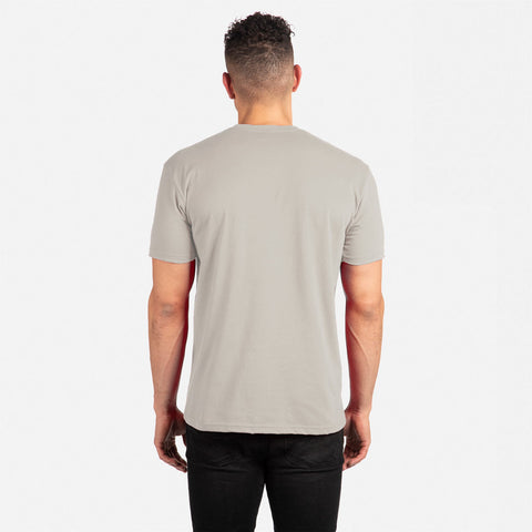 Man wearing a beige t-shirt on a white background