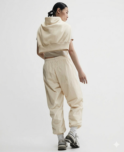 Nike Women's Light Beige Sportswear Essential Mid-Rise Oversized Woven Jogger Pants | Nike In Lebanon