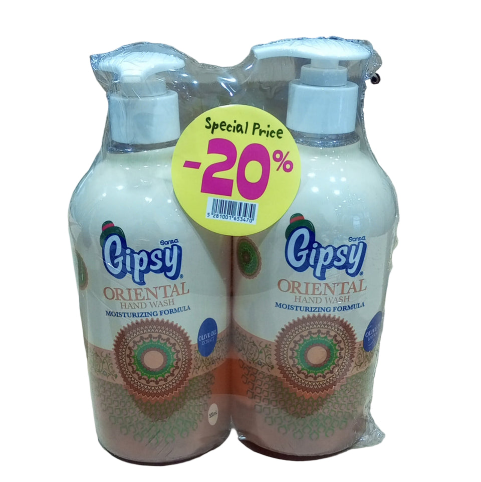 Two bottles of Gypsy Oriental soap with a discount label on a wooden surface.