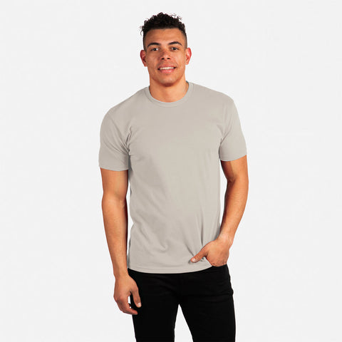 Man wearing a plain gray t-shirt on a white background