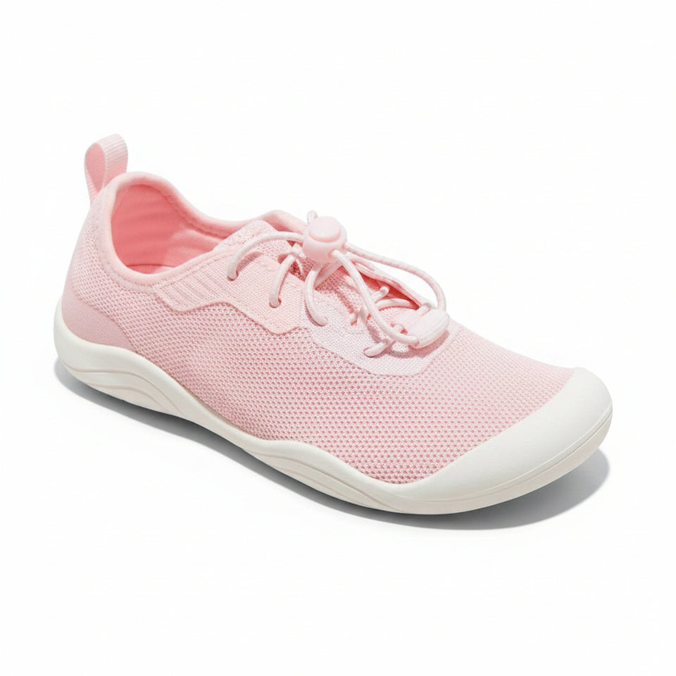 Pink sneaker with white sole on a light gray background