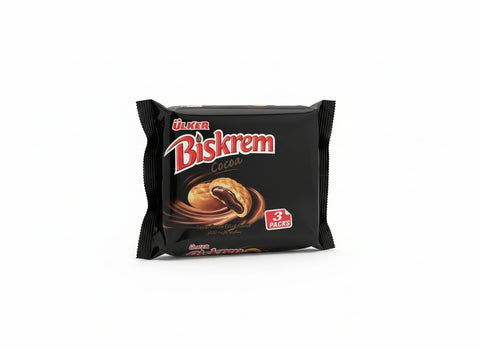 Biskrem chocolate bar packaging held by a hand on a gray surface