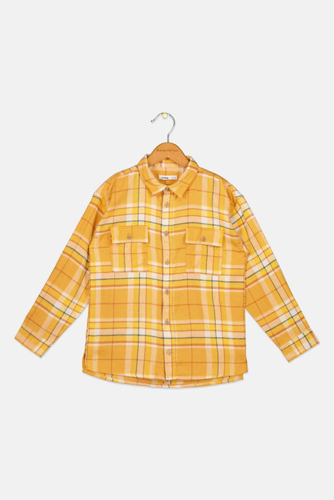 Yellow plaid shirt on a hanger against a white background