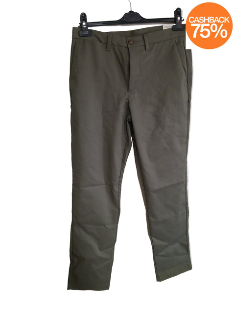 Folded green pants on a white surface